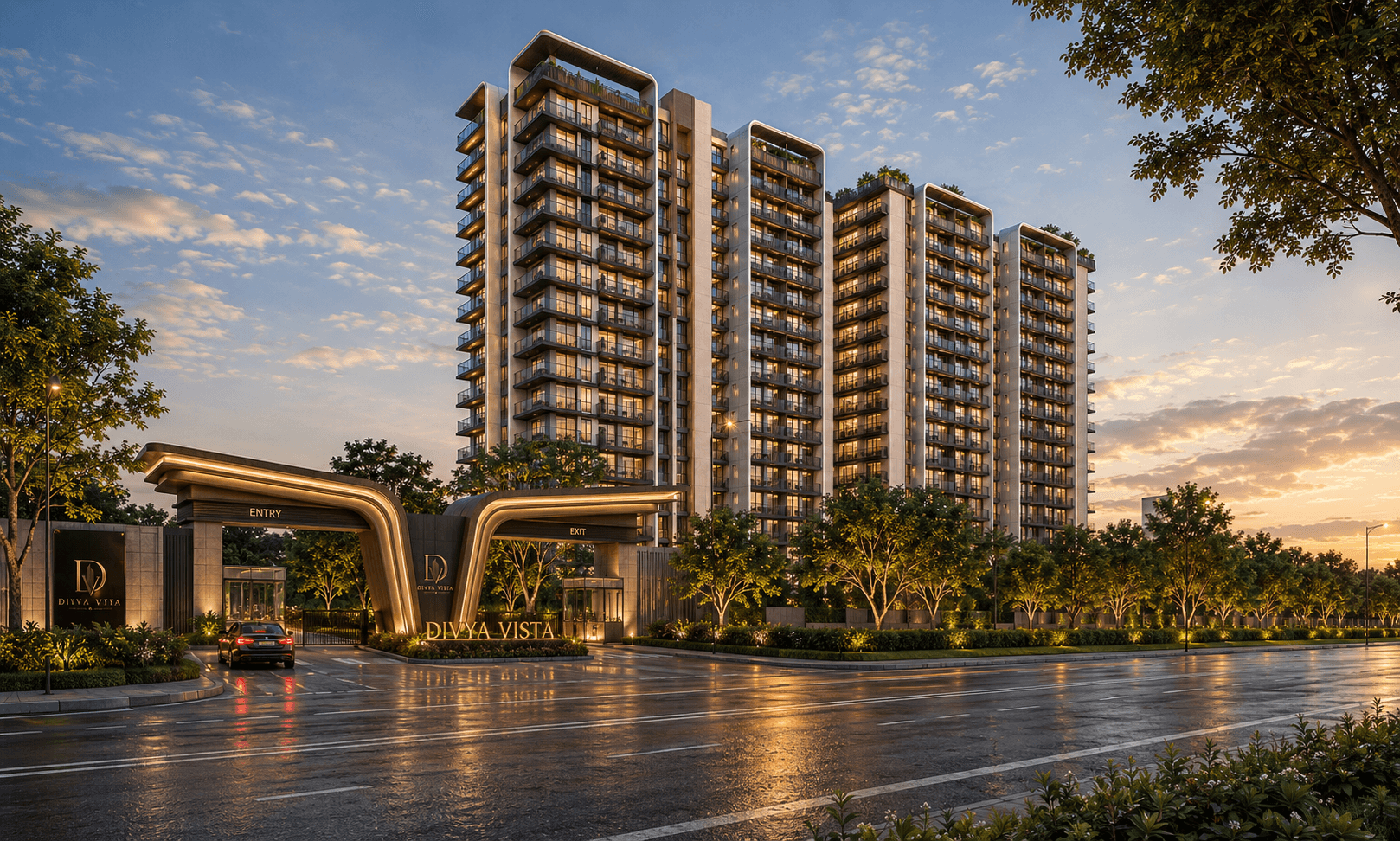 Divya Vista Residences at dusk — lit entry gate and residential towers